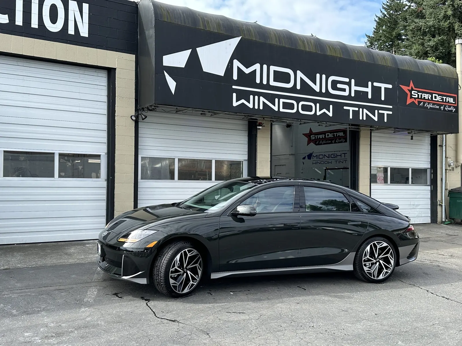 Black Audi sedan with fresh window tint